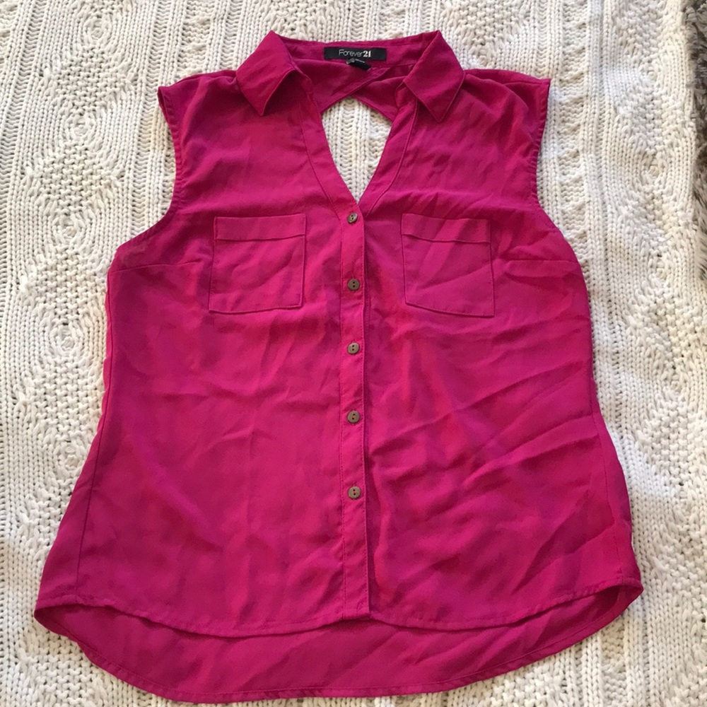 Button up with pockets and open back detail!